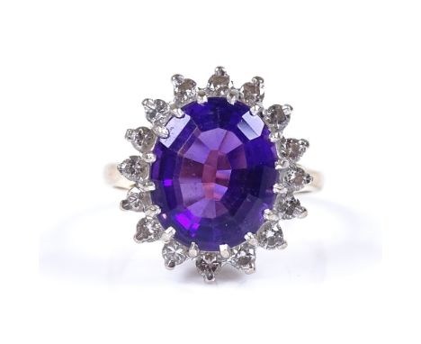 An 18ct gold amethyst and diamond cluster ring, setting height 17.2mm, size O, 6.5g 