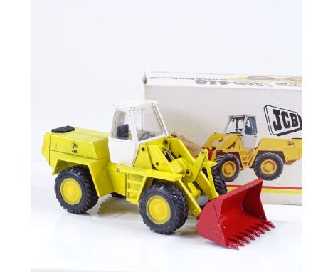 A boxed West German 1;35 scale diecast model JCB418 articulated loader by NZG 