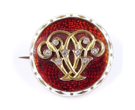 An Antique unmarked gold red and white enamel and diamond circular brooch, with crystal photo panel back, diameter 22.3mm, 8.