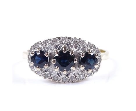 An 18ct gold sapphire and diamond cluster dress ring, setting height 10.6mm, size T, 5.4g 