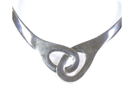 A Mexican sterling silver torque collar necklace, of interlocked design, largest internal width 130mm, 56.8g 