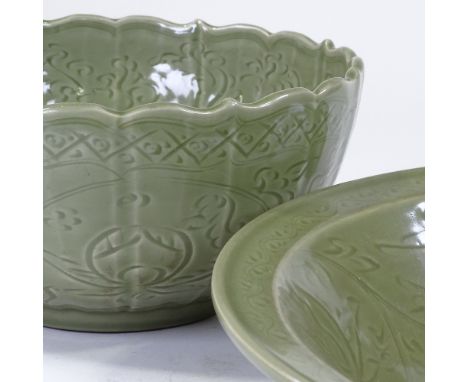 2 similar Chinese green glazed porcelain bowls, with incised decoration, diameter 43cm and 29cm (2) 