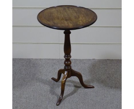 A 19th century circular mahogany dish-top wine table on tripod base, 19" across 