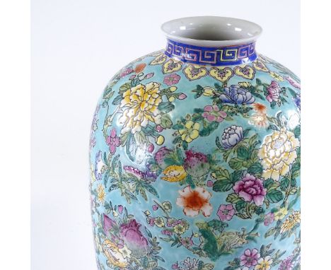 A Chinese porcelain vase, with painted enamel floral decoration, height 45cm 