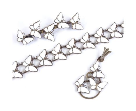 A Danish sterling silver and white enamel butterfly jewellery set, by Volmer Bahner, comprising bracelet, brooch and pendant 