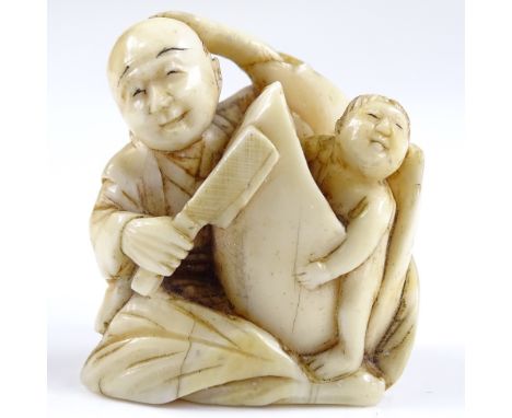 A Japanese Meiji period carved ivory netsuke in the form of 2 figures, height 3cm 