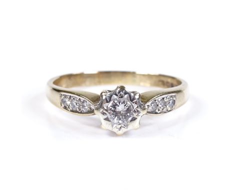 A 9ct gold solitaire diamond ring with diamond set shoulders, total diamond content approx 0.3ct, setting height 6.3mm, size 