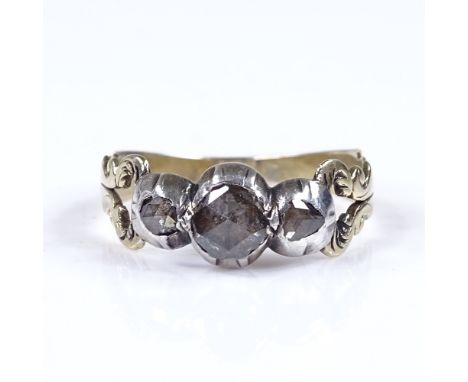 An Antique 3-stone rose-cut diamond ring, with pierced and engraved shoulders, and closed back settings, setting height 6.8mm