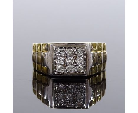 An unmarked gold Rolex style diamond signet ring, total diamond content approx 0.3ct, settings test as 18ct gold, panel heigh