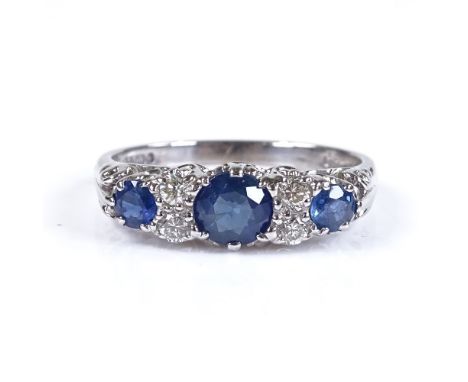 A modern 9ct white gold 7-stone sapphire and diamond dress ring, setting height 6mm, size Q, 3.5g 