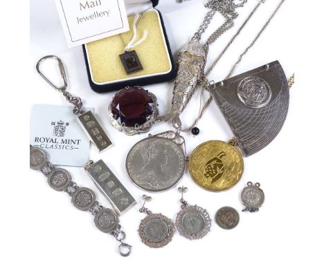 Various silver jewellery, including coin bracelets and sterling pendants 