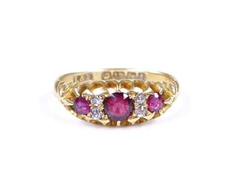 An 18ct gold 7-stone ruby and diamond half-hoop ring, setting height 6.6mm, size M, 2.7g