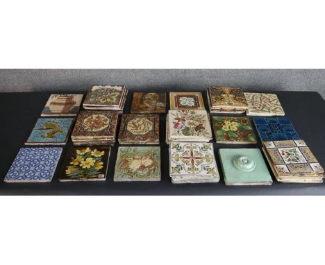 A collection of forty two 19th century ceramic tiles, including a blue glaze Pilkington Art Nouveau peacock feather design ti