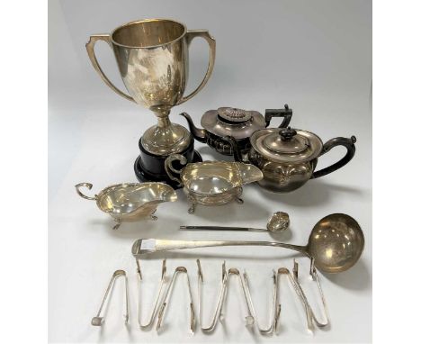 Two silver teapots, a silver trophy, 2 sauceboats and some flatware, 54.8ozt gross