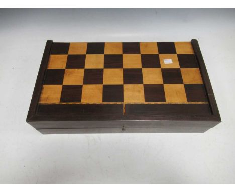 A folding inlaid wood draughts and backgammon boardmasurements for this lot is 11 x 46 x 27 cm