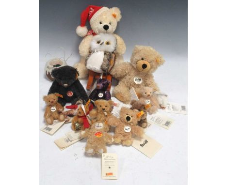 A collection of modern Steiff bears, to include four miniature plush jointed bears, two miniature Christmas bears, three keyr