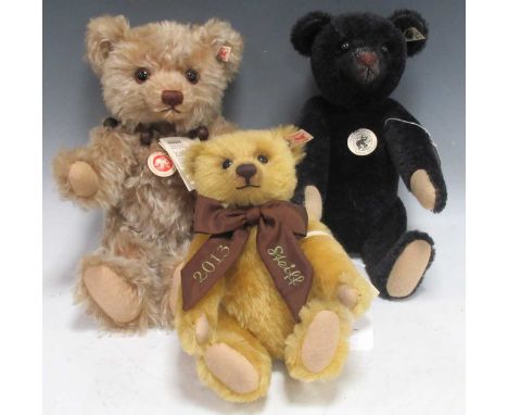 Three modern Steiff bears, comprising a 1908 replica bear with growler box, approx 35cm, a British Collectors bear 2012, with