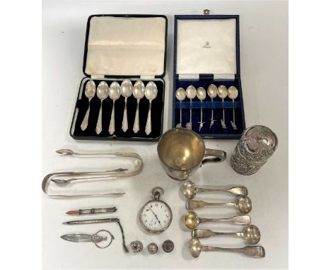 A collection of silverware including a christening cup, flatware, open faced pocket watch, cosmetics jar etc, 10.5ozt weighab