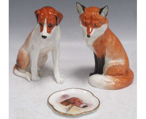 A Royal Worcester model of a seated fox 2993 19cm high and hound 18cm high and a Mintons quatrefoil shaped tray with hound in