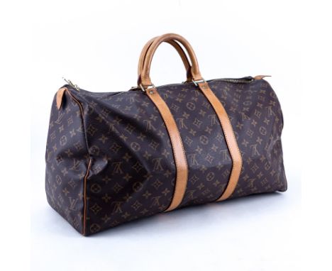 Louis Vuitton Brown Monogram Coated Canvas Keepall Travel Bag 50. Golden brass hardware. Brown canvas interior. Labeled appro