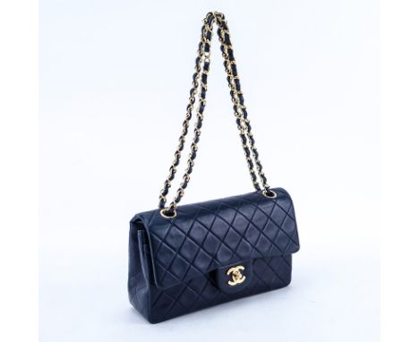 Chanel Navy Blue Quilted Leather Classic Double Flap Bag 23. Gold tone hardware, interior of burgundy leather with patch pock