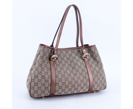 Gucci Beige/Metallic Brown And Leather Monogram Canvas Twins PM Tote. Gold and silver tone hardware. Signature fabric interio