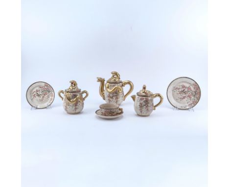 Twenty Nine (29) Piece Japanese Satsuma Hand Painted Porcelain Tea Set. Meiji period. Includes: 2 plates 7-1/4", 8 plates 6",