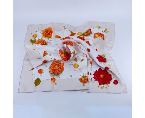 Hermes Silk Scarf "Orange Rose Motif". Labeled appropriately. Good condition. Measures 34" x 70". Shipping $30.00 (estimate $
