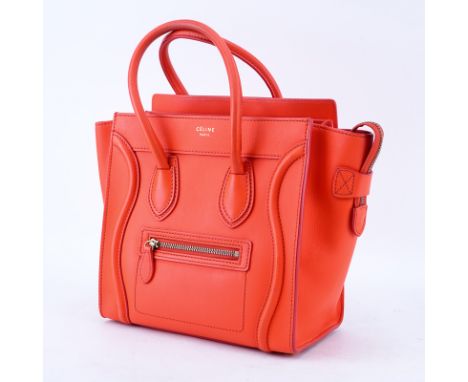 Celine Orange Smooth Leather Luggage MM Tote. Gold tone hardware, the interior matching dark orange leather with zippered and