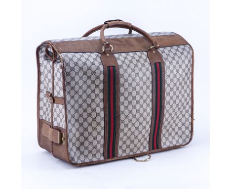 Vintage Gucci Monogram Luggage Garment Bag. Monogram canvas with leather and striped accents and gold-tone hardware, accompan