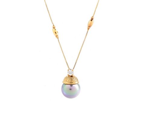 Vintage Italian Round Brilliant Cut Diamond, South Sea Pearl and 14 Karat Yellow Gold Pendant Necklace. Pearl measures 14mm, 