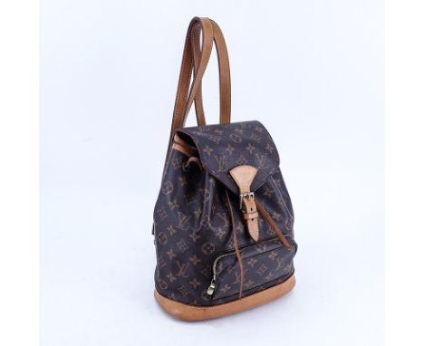 Louis Vuitton Brown Monogram Coated Canvas Montsouris MM Backpack. Golden brass hardware, vachetta leather. Brown canvas inte