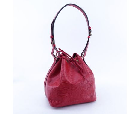 Louis Vuitton Red Epi Leather Noe PM Bag. Golden brass hardware. Red suede interior. Labeled appropriately. Good condition wi