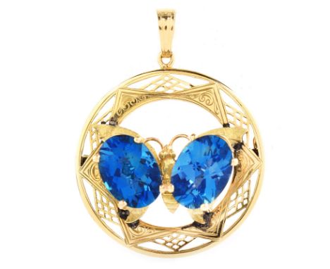 Vintage Oval Cut London Blue Topaz and 14 Karat Yellow Gold Butterfly Pendant / Brooch. Topaz measure 13.5 x 10.0mm. Stamped 
