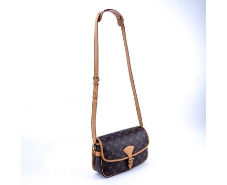 Louis Vuitton Brown Monogram Coated Canvas Sologne Shoulder Bag. Golden brass hardware, vachetta strap. Brown canvas interior