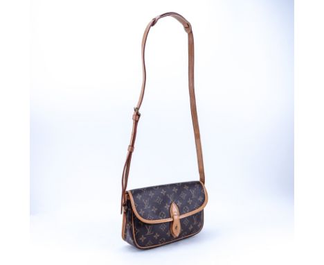 Louis Vuitton Brown Monogram Coated Canvas And Leather Gibeciere PM Shoulder Bag. Golden brass hardware, vachetta leather str