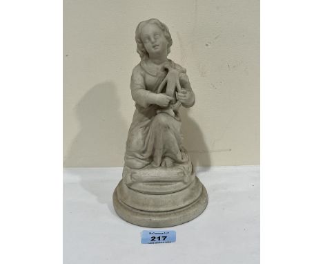 A 19th Century Parian figure, girl playing a lyre. 9" high.