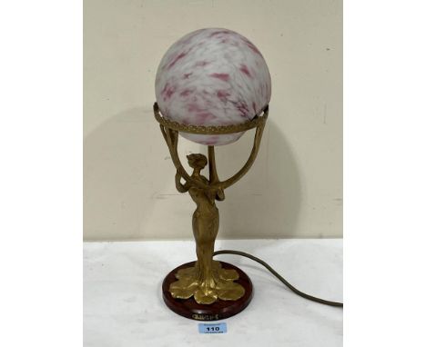 An early 20th Century Art-Nouveau gilt metal figural table lamp with frosted marbelled globular shade. 15" high.