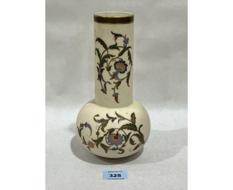 A Royal Worcester blush ivory vase, gilded and painted with trailing foliage. 9" high.