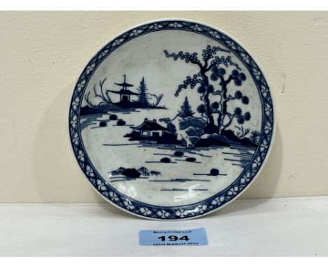 An 18th Century Worcester cannonball pattern saucer.