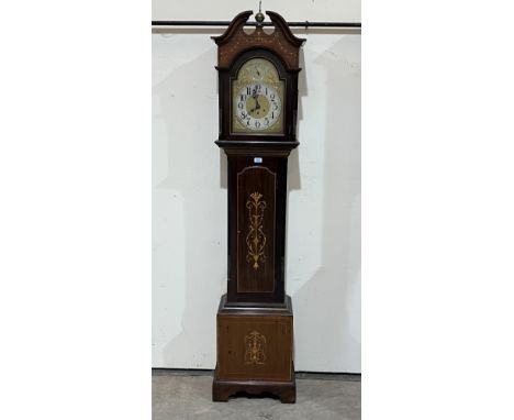 A mahogany longcase clock of recent manufacture, the three train spring barrel movement chiming and striking on five tubular 