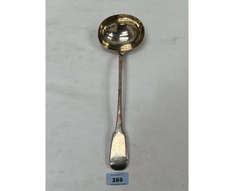 A George III silver fiddle pattern soup ladle. London 1815. 13" long. 5ozs 19dwts.