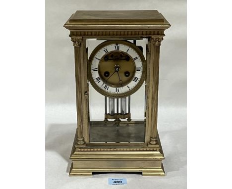 A late 19th Century French gilt brass four glass mantle clock; the drum movement with Brocot escapement striking the hours an