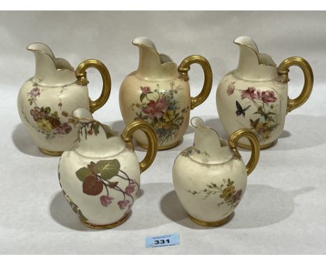 Five Royal Worcester tusk jugs. Shape 1094. 6" high and smaller.