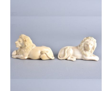 Pair of European School Carved Ivory Recumbent Lion Figurines. Each measures 2-5/8" H x 5" L. We Will Not Ship This Item Out 