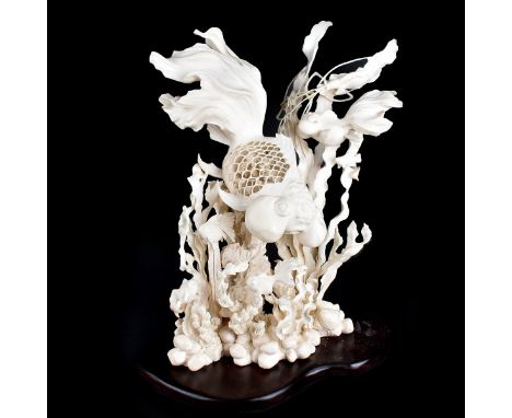 Detailed large Chinese carved ivory sculpture depicting a vibrant and busy underwater scene. Etremely detailed and well done.