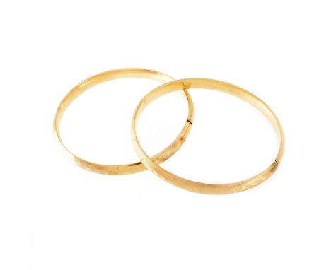 Two (2) Vintage 14 Karat Yellow Gold Hinged Bangle Bracelets. One stamped 14K. Measure 1/4" W, 2-1/4" interior diam. Approx. 