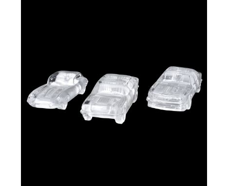 Grouping of Three (3) Vintage Art Glass Model Cars. Unsigned. Largest measures 2-1/4" H x 7-3/4" L, smallest measures 2" H x 