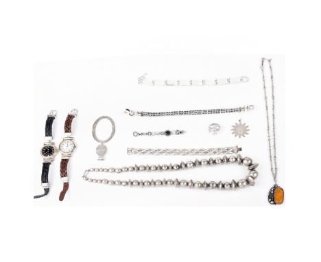 Collection of Vintage Silver Jewelry Including a Large Bead Necklace, a Pendant Necklace with Amber, Three Bracelets (one wit