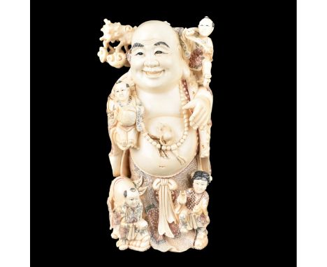 Large Japanese Carved Ivory Okimono. Depicts a Buddha with children. Unsigned. Measures 10-1/4" H x 5-3/4" W. We Will Not Shi